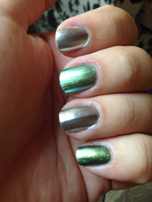 Green and silver! Goes pretty well with my ring :)