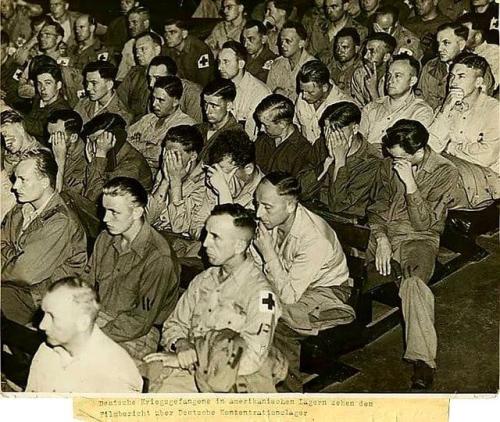 German prisoners, captured by the U.S. in 1945, are forced to watch footage of the concentration camps. (650x548) Check this blog!