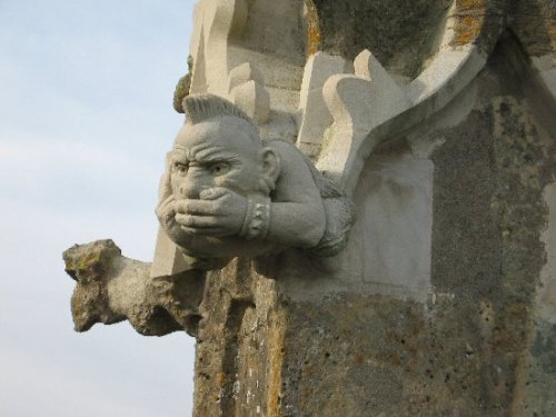 irisharchaeology:With his Mohican style haircut and raised...