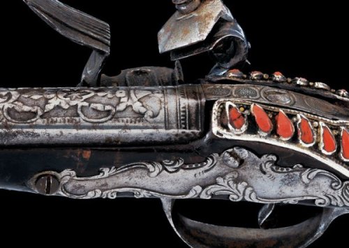 peashooter85:An original silver and coral mounted flintlock...