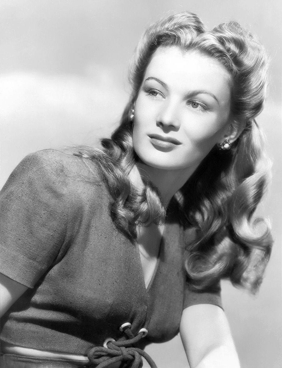 wehadfacesthen:
“ Veronica Lake, 1943
During World War II, the US government asked Lake to change her trademark peek-a-boo hairstyle to encourage women working war-related factory jobs to adopt more practical, safer hairstyles. So this look was the...