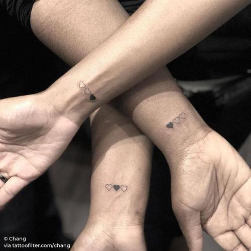 By Chang, done at West 4 Tattoo, Manhattan.... matching;chang;micro;family;matching tattoos for siblings;sister;facebook;matching sister;wrist;twitter;minimalist;on dark skin;other