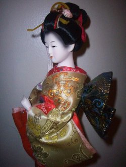 porcelain geisha doll