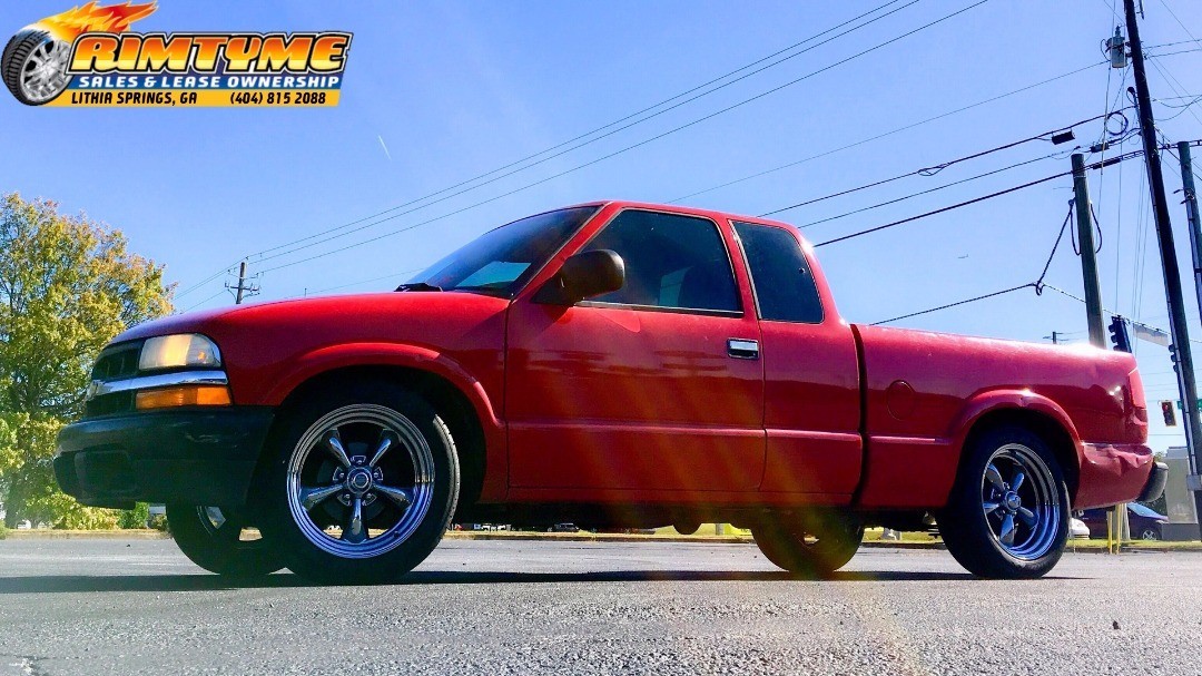 2003 Chevy S10 sitting on 18” American Racing... RimTyme Custom