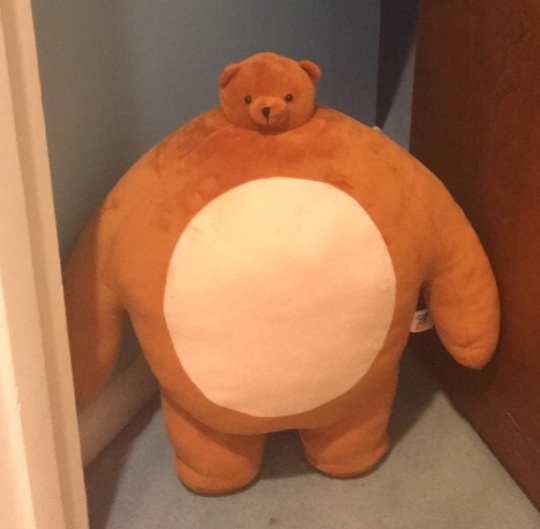 big teddy bear with small head