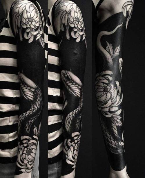 By Alex Tabuns, done at Blackout Tattoo Collective, Saint... deniaktemirov;flower;alex tabuns;animal;chrysanthemum;huge;snake;facebook;nature;blackwork;twitter;sleeve