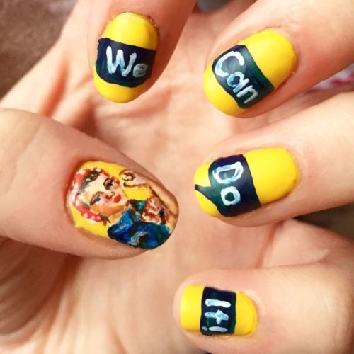 thedailynail:Day 92Rosie the Riveter Nails!I painted these...