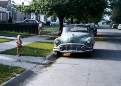 @60's cars on the street