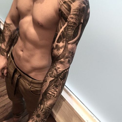 african arm tattoo