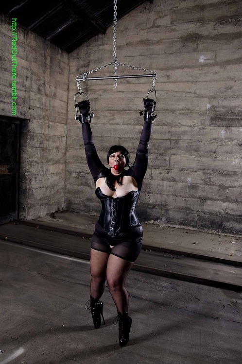 tiedoutthere:Polly hangs out in her corset and ballet boots.