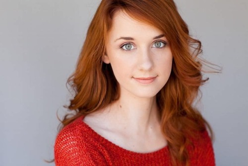 gloriouslyred:Laura Spencer looking good in that red sweater.