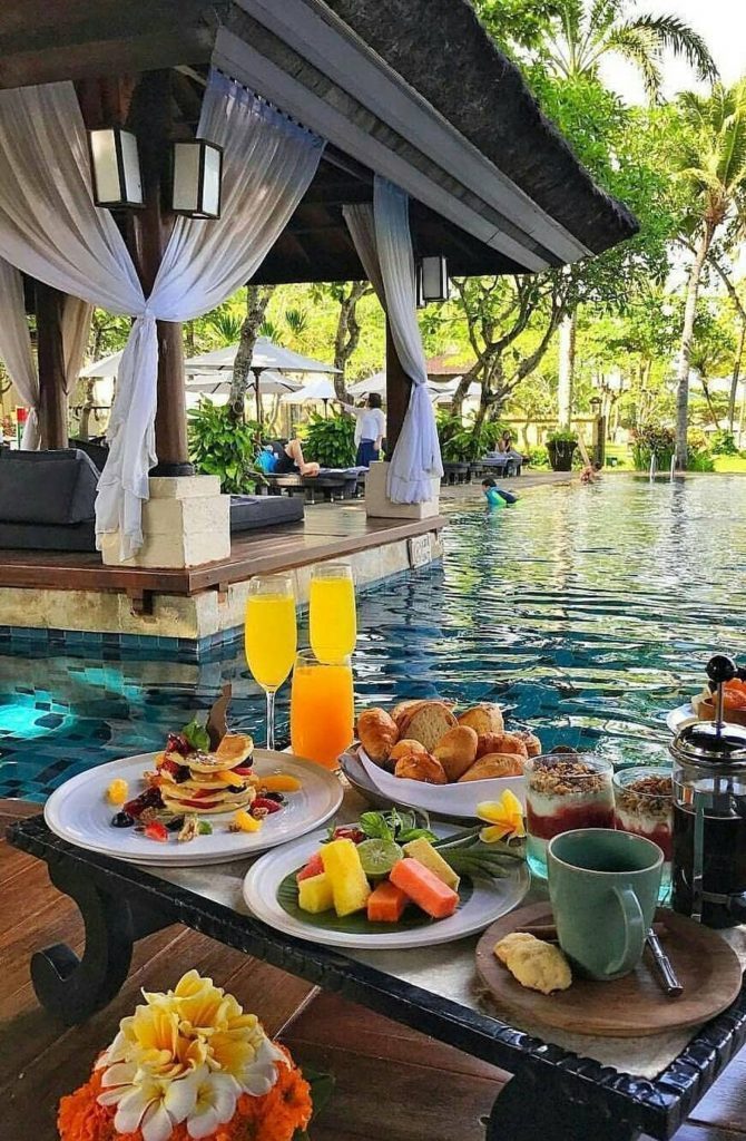 Breakfast on the pool at intercontinentalbaliresort Bali Indonesia