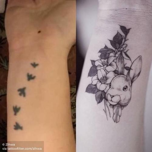 By Zihwa, done at Reindeer Tattoo Studio, Seoul.... flower;lily;animal;cover ups;zihwa;rabbit;facebook;nature;wrist;twitter;illustrative