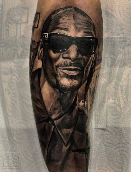By Sergio Fernández, done at Seven Tattoo, Malaga.... music;black and grey;patriotic;big;rapper;sergiofernandez;united states of america;character;facebook;twitter;portrait;inner forearm;snoop dogg