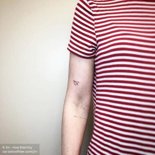By Jin · Hoa Eternity, done at HighLine Tattoo NYC, Manhattan.... small;jin;micro;line art;japanese culture;tiny;travel;ifttt;little;minimalist;game;origami;fine line;paper plane;patriotic;bicep
