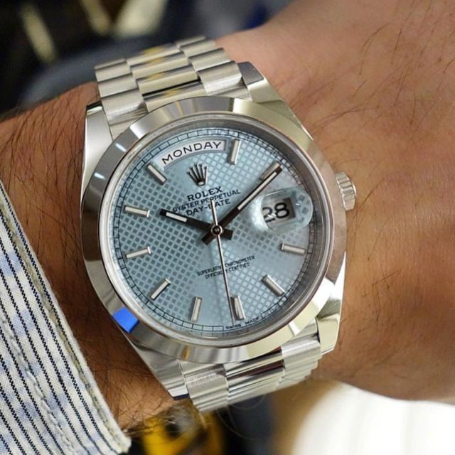 rolex day date platinum on wrist