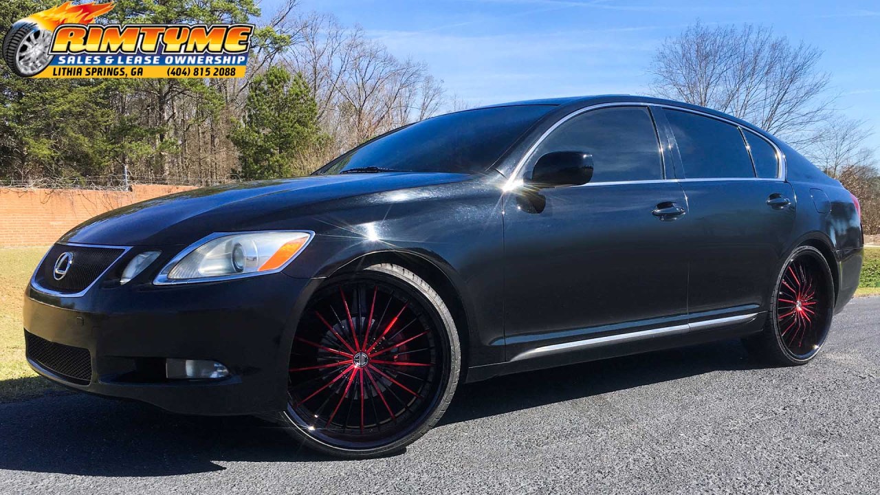 Lexus GS 300 sitting on 22” 2crave no26 Black and Red Wheels wrapped in 235-30-22 Lexani Tires