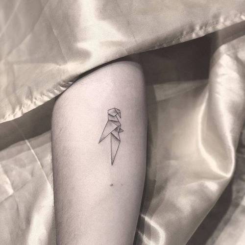 By Chang, done at West 4 Tattoo, Manhattan.... small;chang;animal;tiny;origami parrot;parrot;bird;ifttt;little;game;inner forearm;illustrative;origami