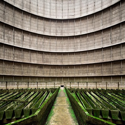 thibaudpoirier:<br /><br />Inside an abandoned cooling tower. This particular one is from the Electrabel power plant, located in Monceau-sur-Sambre, Belgium. Built in 1921, it produced energy from coal and was once responsable for 10% of the entire country’s CO2 emissions. It was shut down in 2007 and is now a symbol of the fading industrial region of Charleroi.Photography by Thibaud Poirier / Behance / Instagram