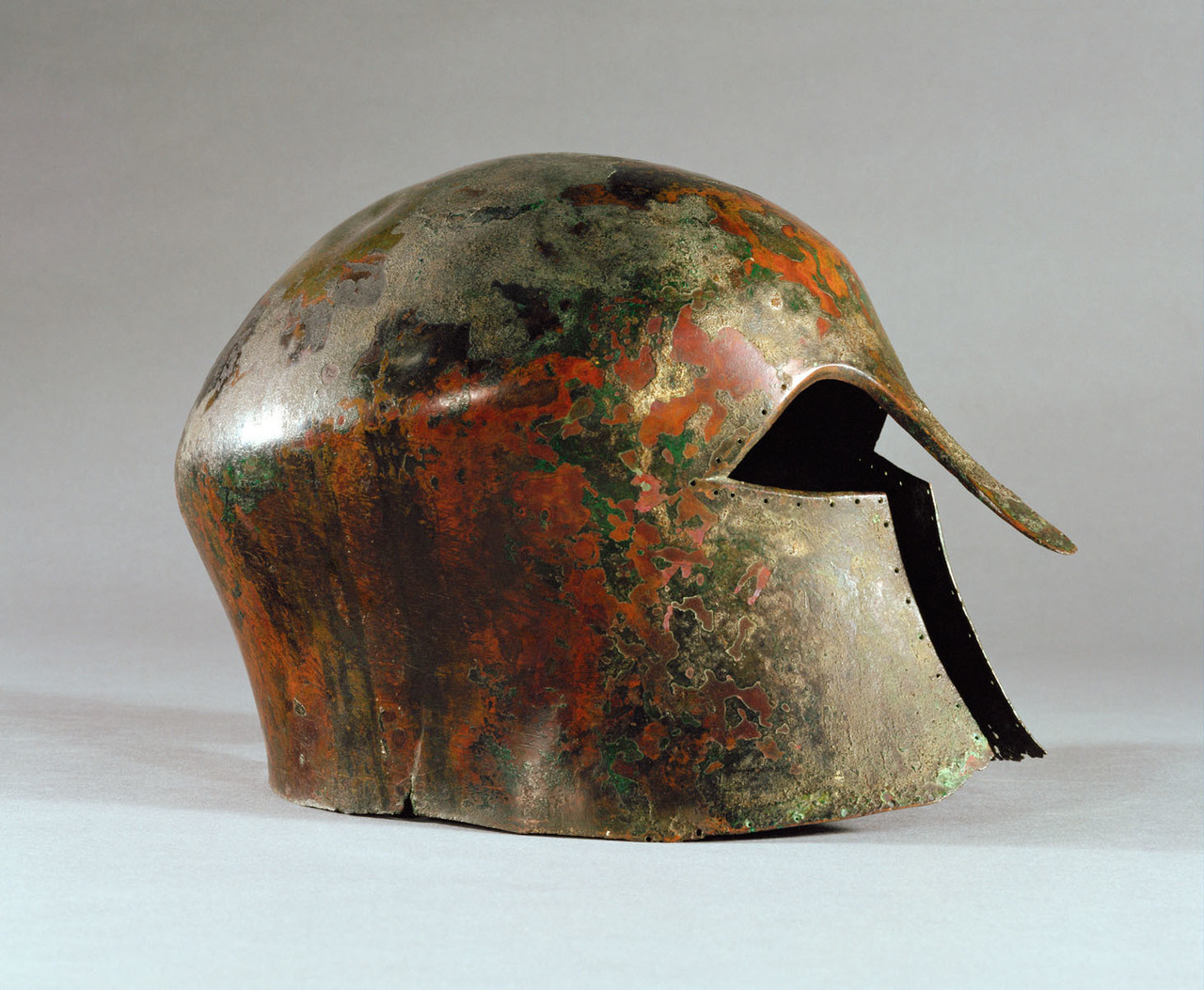 Arm the Armour — A bronze helmet in classic Corinthian style,...