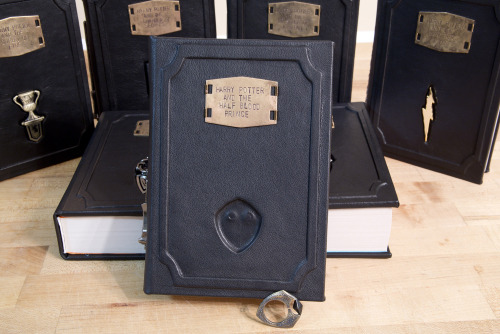 nerdismindecor:Custom created leather bound Harry Potter books...