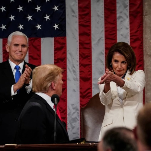 House Speaker Nancy Pelosi offers applause during President...