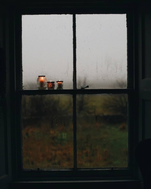 window candles rain autumn fall