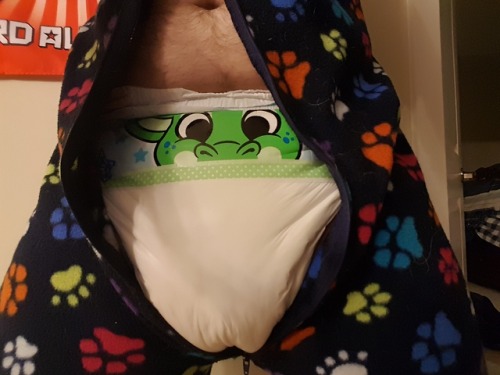 genericdiaperblog:Double peekABUs over my cage, zip up my...