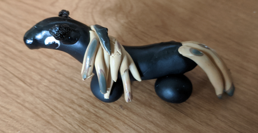 Long ceramic black horse.
