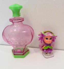 little dolls in perfume bottles