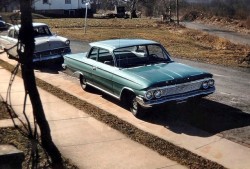 @60's cars on the street