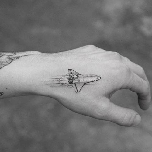 By Sanghyuk Ko · MR.K, done at Bang Bang Tattoo, Manhattan.... spacecraft;small;single needle;tiny;mrk;space shuttle;travel;ifttt;little;hand