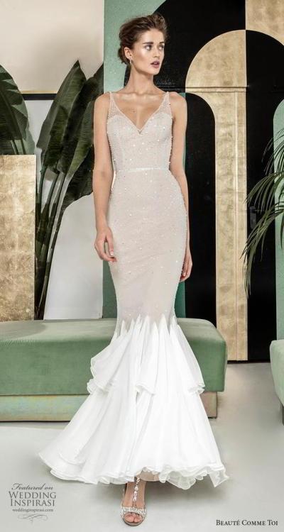 Step up your bridal glam game with MIRIANNA. This sleeveless...