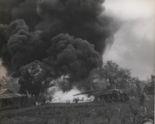 captain-price-official:A USMC M5 flame-throwing tank torches a...