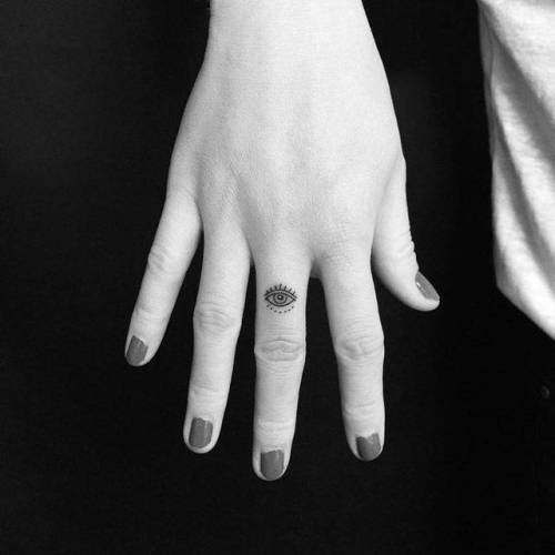By Jing, done at Jing’s Tattoo, Queens.... jing;small;finger;good luck;anatomy;micro;tiny;eye;ifttt;little;minimalist;other
