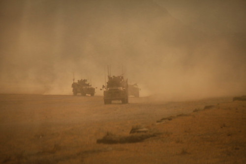 Members with the 10th Special Forces Group (Airborne), alongside...