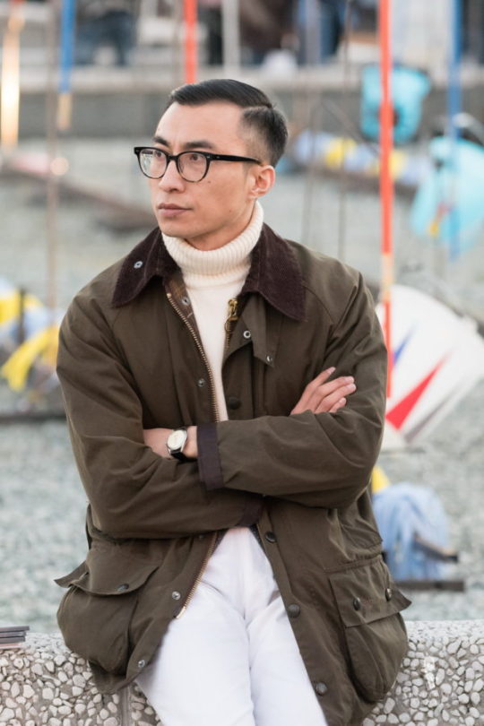 Wax jacket with turtleneck and off white sweater with white pants