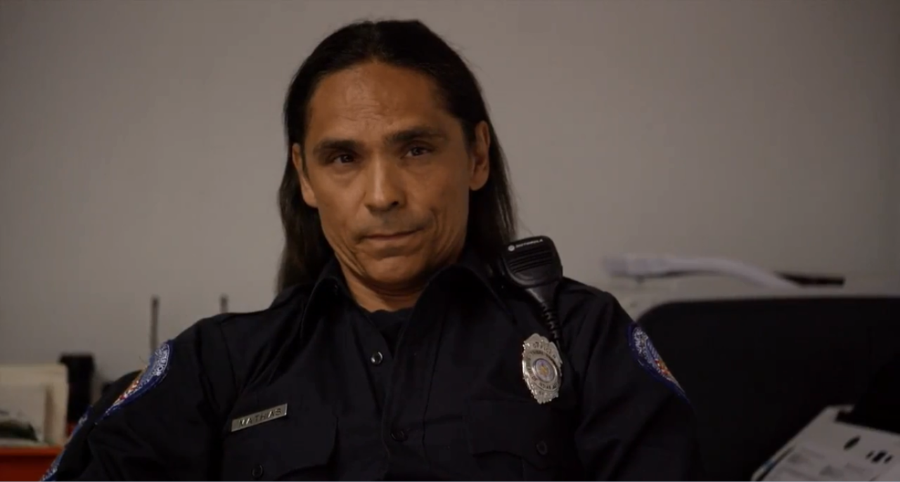 Zahn McClarnon as Officer Mathias in Longmire : My Moonchild