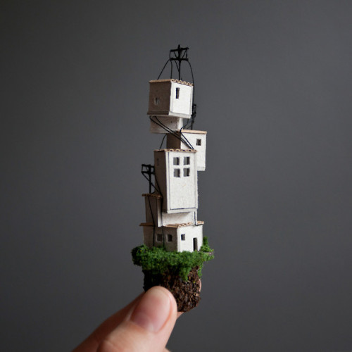 archatlas:Miniature Houses on Cork Cliffs Float Inside...