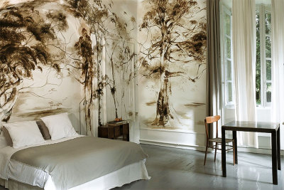 French artist Claire Basler lives and paints in her home Château de Beauvoir where she creates huge paintings of flowers. The place looks blooming - an eternal summer