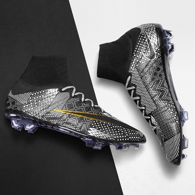 nike football boots black with white tick