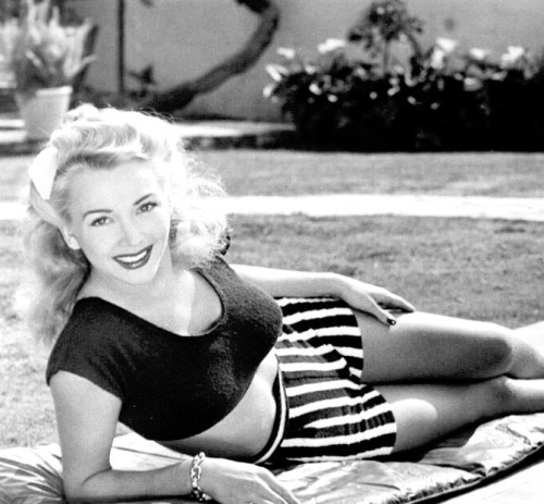 summers-in-hollywood:Carole Landis sunbathing, 1943