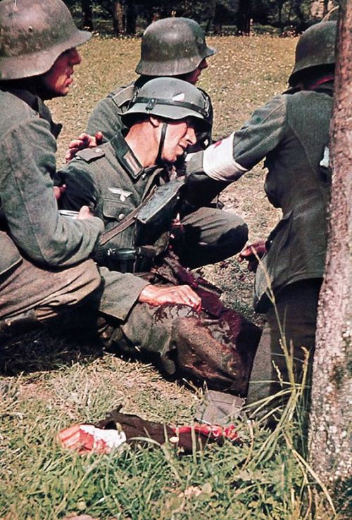 historicaltimes:A Wehrmacht infantryman with his arm blown...