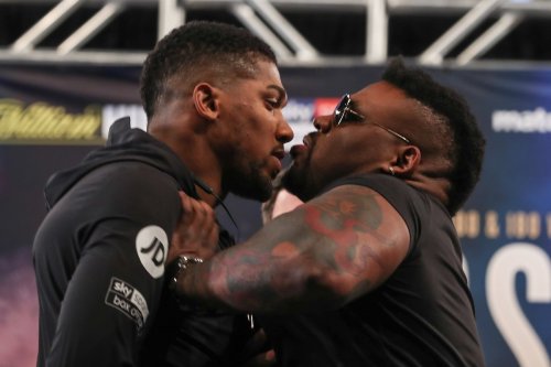 Jarrell Miller (right) and Anthony Joshua (left) having a confrontation at the weigh ins.  