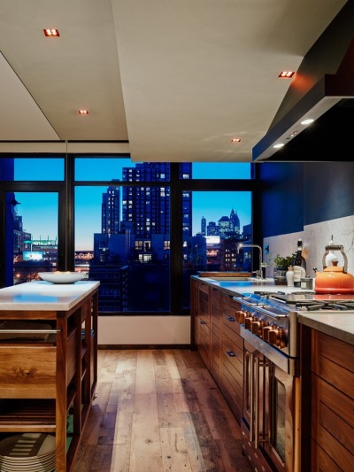 Kitchen features custom cabinetry and reclaimed oak flooring in this apartment in the Vinegar Hilll neighborhood of Brooklyn. [1680 × 2236]