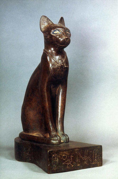egypt-museum:“ The Goddess Bastet  Statuette of a cat representing the goddess Bastet, bearing the cartouche of Psamtik I (bronze and gold). Late/Saite Period, 26th Dynasty, ca. 664-610 BC. Now in the Louvre.”