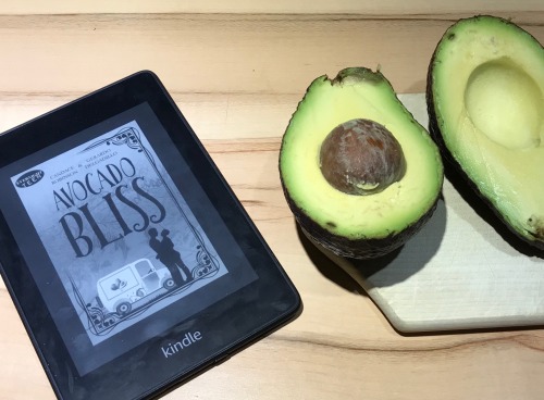 kindle showing avocado bliss next to an avocado