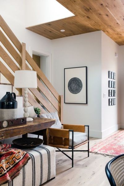 Hallway and Light Hardwood Floor The entryway serves as the most welcoming spot in the home, with a multitude of textures lending a homely feel.