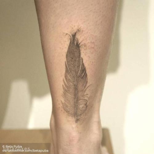 By Beta Puba, done in Berlin. http://ttoo.co/p/31502 betapuba;dotwork;native american;feather;hand poked;facebook;twitter;achilles;medium size