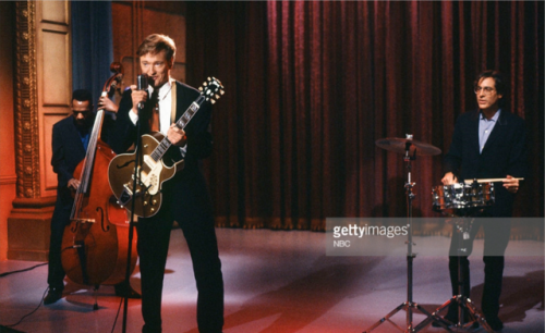 conanobrien1963:conan playing guitar on late night with conan...